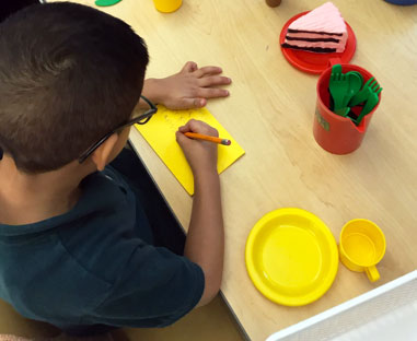 storybook-extensions-boy-at-desk